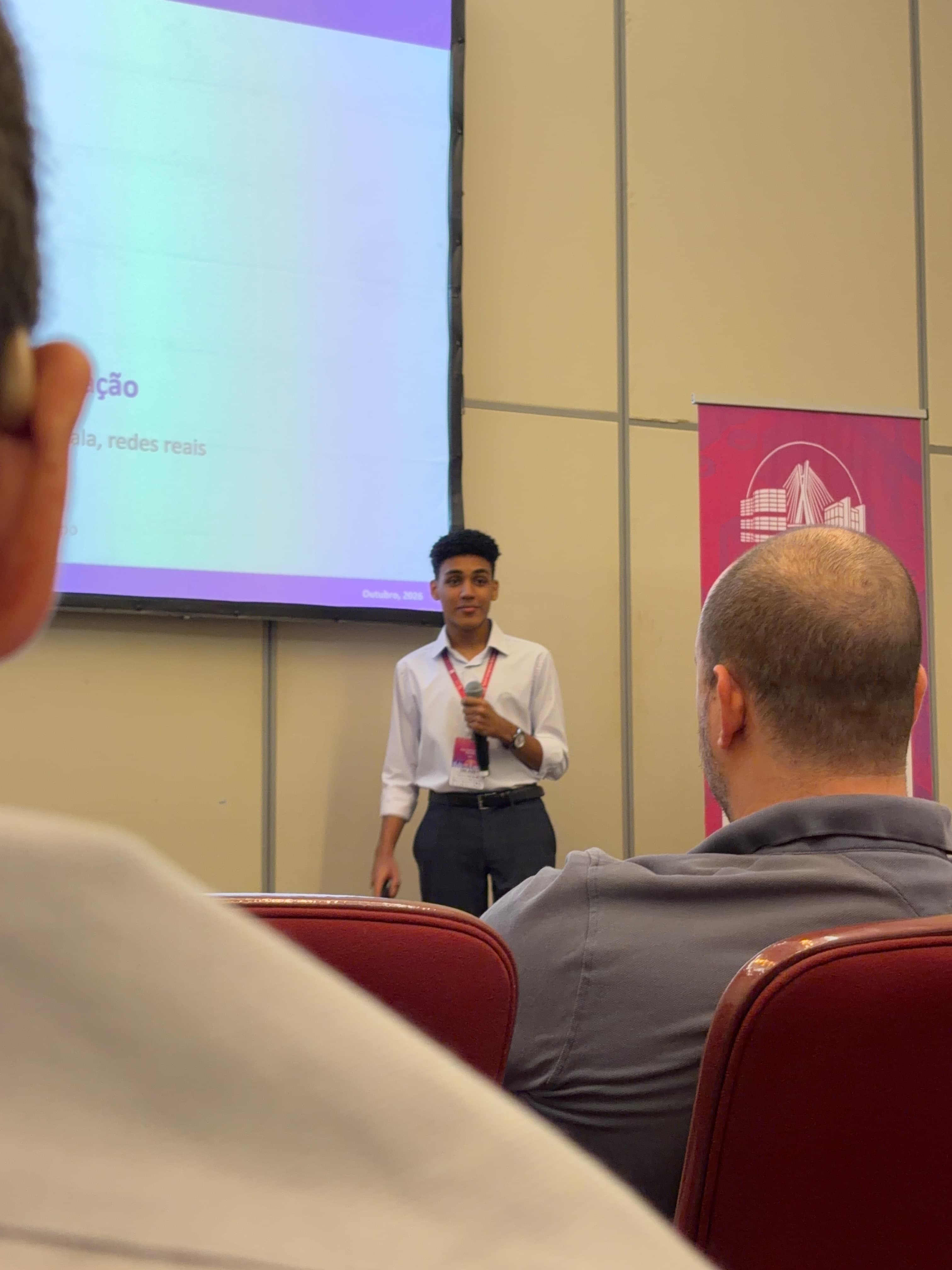 João speaking to the audience during the CBA 2026 presentation